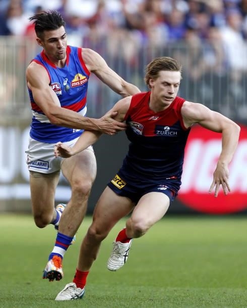 Easton Wood of the Bulldogs and Charlie Spargo of the Demons compete for the ball during the 2021 Toyota AFL Grand Final match between the Melbourne...