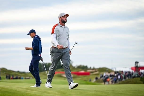 Jon Rahm of Spain and Team Europe celebrates after making an eagle putt on the 16th hole green during Saturday Afternoon Four-ball Matches of the...