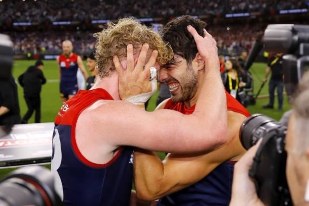 Clayton Oliver of the Demons and Christian Petracca of the Demons celebrate during the 2021 Toyota AFL Grand Final match between the Melbourne Demons...