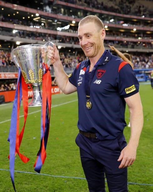 Simon Goodwin, Senior Coach of the Demons celebrates with the premiership cup during the 2021 Toyota AFL Grand Final match between the Melbourne...