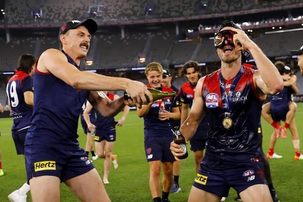 Jake Lever of the Demons and Alex Neal-Bullen of the Demons celebrate during the 2021 Toyota AFL Grand Final match between the Melbourne Demons and...