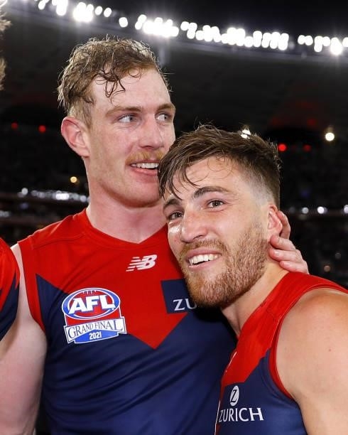 Harrison Petty of the Demons and Jack Viney of the Demons celebrate during the 2021 Toyota AFL Grand Final match between the Melbourne Demons and the...