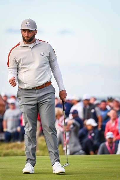 Jon Rahm of Spain and Team Europe celebrates with a fist pump after making a putt on the 15th hole green during Saturday Afternoon Four-ball Matches...