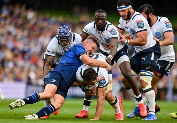Dublin , Ireland - 25 September 2021; Harold Vorster of Vodacom Bulls is tackled by Jonathan Sexton of Leinster during the United Rugby Championship...
