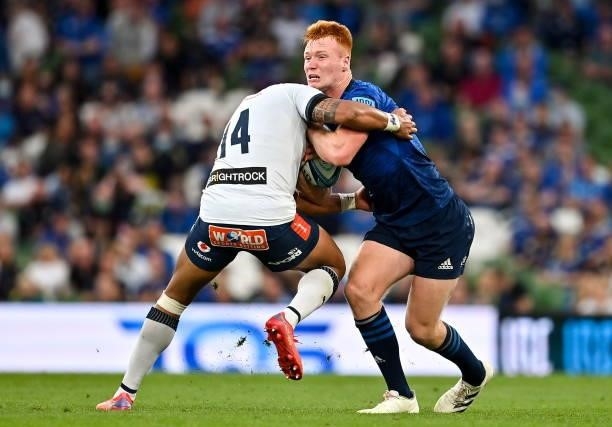 Dublin , Ireland - 25 September 2021; Ciarán Frawley of Leinster is tackled by Cornal Hendricks of Vodacom Bulls during the United Rugby Championship...