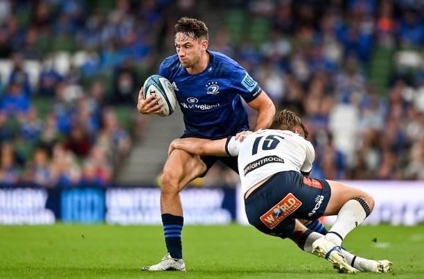 Dublin , Ireland - 25 September 2021; Hugo Keenan of Leinster is tackled by David Kriel of Vodacom Bulls during the United Rugby Championship match...