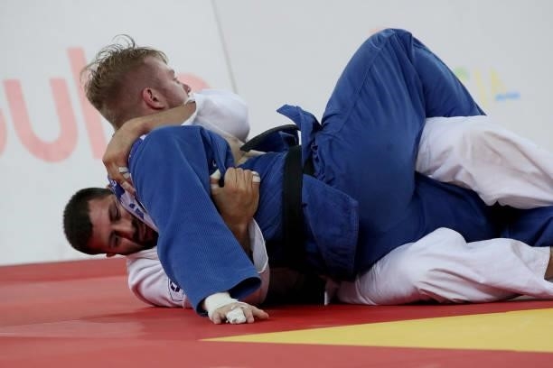 Arman Adamian of Russia and Dario Kurbjeweit Garcia of Germany compete in the Men's -100kg final match during day 3 of the Judo Grand Prix Zagreb...