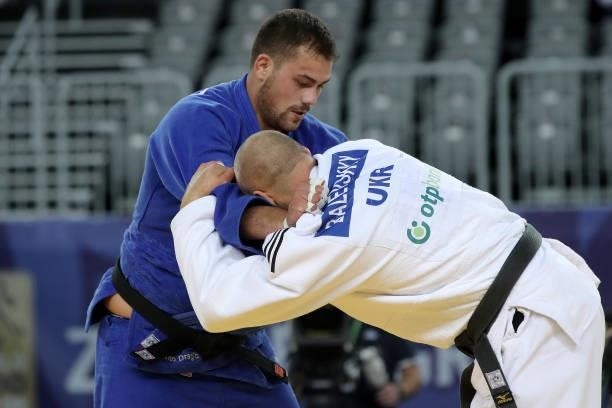 Yevheniy Balyevskyy of Ukraine and Vito Dragic of Slovenia compete in the Men's +100kg bronze medal match during day 3 of the Judo Grand Prix Zagreb...