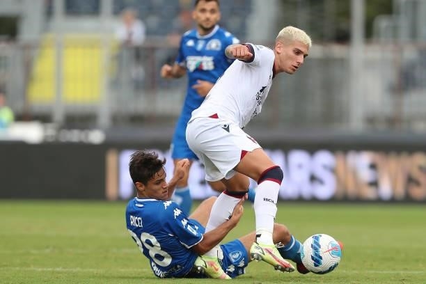 Nicolas Martin Dominguez of Bologna FC in action against Samuele Ricci of Empoli FC during the Serie A match between Empoli FC and Bologna FC at...