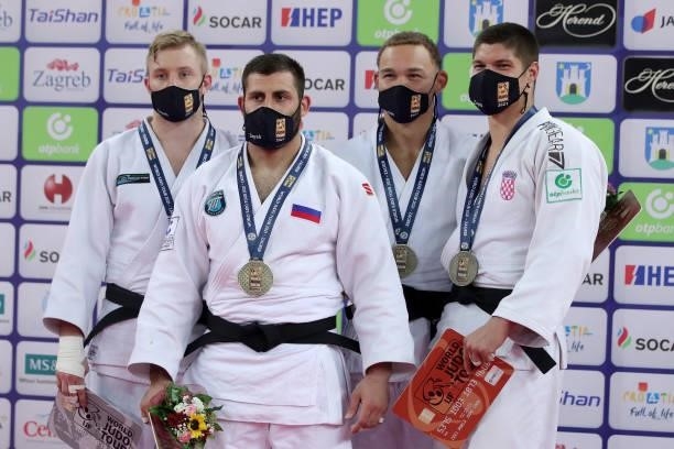 Silver medalist Dario Kurbjeweit Garcia of Germany, gold medalist Arman Adamian of Russia and bronze medalists Simeon Catharina of Netherlands and...