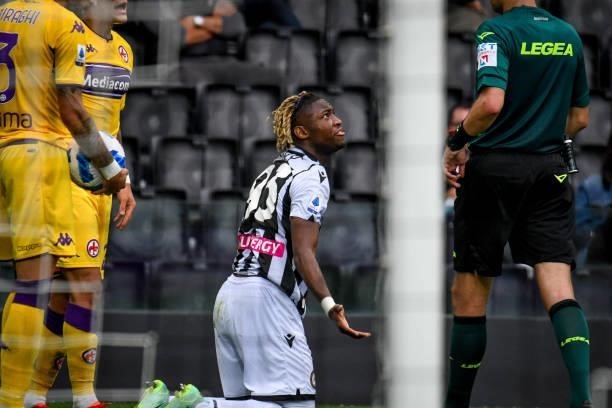 Brandon Soppy talks to rthe referee of the match Davide Ghersini after getting a foul during the Italian football Serie A match Udinese Calcio vs ACF...