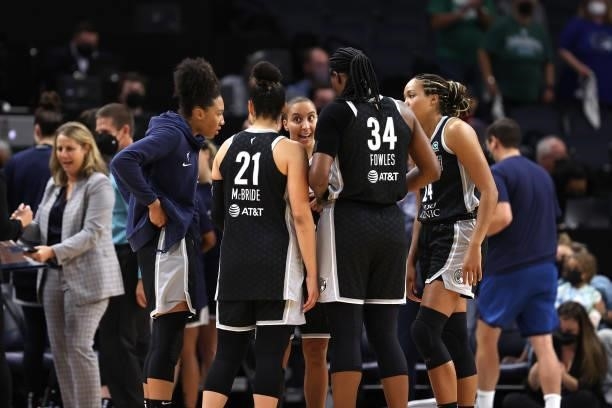 Layshia Clarendon of the Minnesota Lynx huddles up with teammates before the game against the Chicago Sky during the 2021 WNBA Playoffs on September...