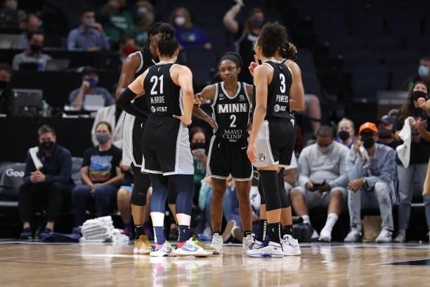 Crystal Dangerfield of the Minnesota Lynx and teammates huddle up before the game against the Chicago Sky during the 2021 WNBA Playoffs on September...