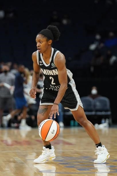 Crystal Dangerfield of the Minnesota Lynx handles the ball during the game against the Chicago Sky during the 2021 WNBA Playoffs on September 26,...