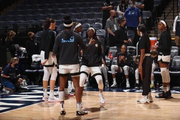 Kahleah Copper of the Chicago Sky high fives teammate before the game against the Minnesota Lynx during the 2021 WNBA Playoffs on September 26, 2021...