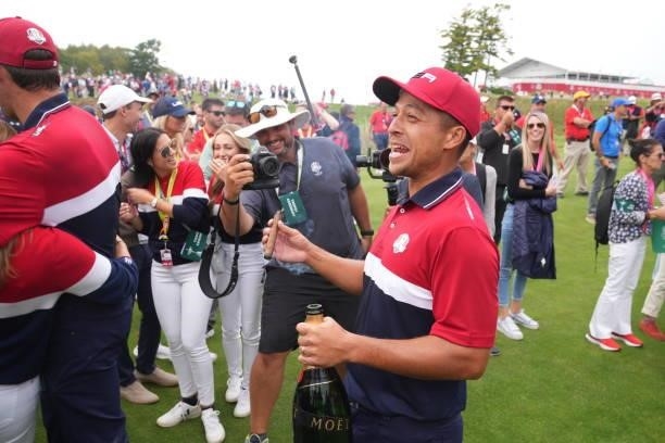 Xander Schauffele of Team United States smokes a cigar to celebrate the United Statesvictory in the 2020 Ryder Cup at Whistling Straits on September...