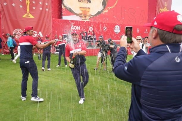 Tony Finau and Bryson DeChambeau, both of Team United States celebrate after the United States victory in the 2020 Ryder Cup at Whistling Straits on...