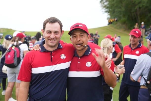 Xander Schauffele of Team United States and Patrick Cantlay of Team United States pose for a photo after the United States victory in the 2020 Ryder...