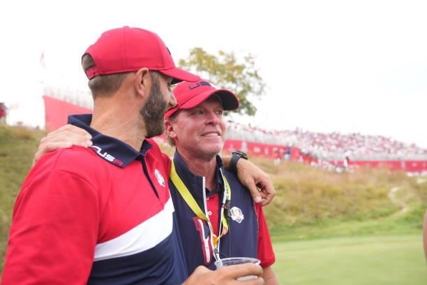 United States Captain Steve Stricker and Dustin Johnson of Team United States congratulate each other after the United States victory in the 2020...