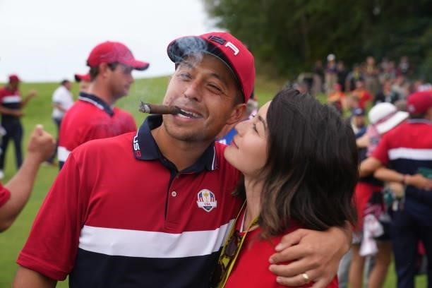 Xander Schauffele of Team United States gets a hug from his wife after the United States victory in the 2020 Ryder Cup at Whistling Straits on...