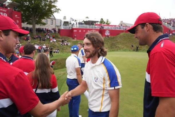 Tommy Fleetwood of England and Team Europe, R, congratulates Harris English of Team United States after the United States victory in the 2020 Ryder...