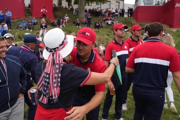 Jordan Spieth of Team United States gets a hug after the United States victory in the 2020 Ryder Cup at Whistling Straits on September 26, 2021 in...