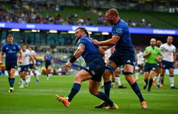 Dublin , Ireland - 25 September 2021; Andrew Porter of Leinster celebrates after scoring his side's second try with Ross Molony during the United...