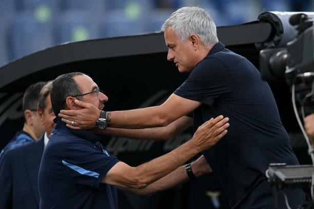 Jose Mourinho manager of AS Roma greets Maurizio Sarri manager of SS Lazio during the Serie A match between SS Lazio and AS Roma at Stadio Olimpico,...