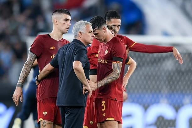Jose Mourinho manager of AS Roma comforts Roger Ibanez of AS Roma at the end of the Serie A match between SS Lazio and AS Roma at Stadio Olimpico,...