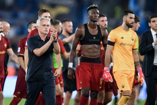 Jose Mourinho manager of AS Roma greets his supporters with his players at the end of the Serie A match between SS Lazio and AS Roma at Stadio...