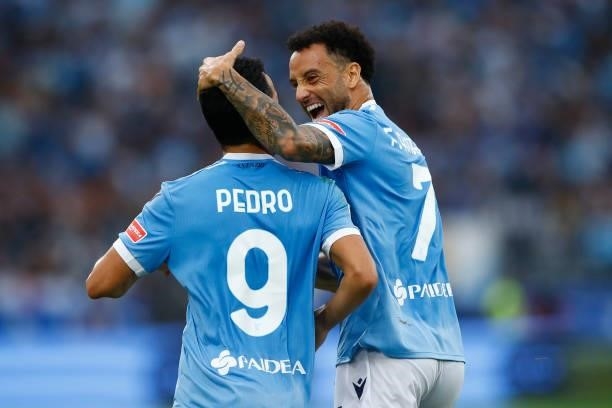 Pedro of SS Lazio celebrates after scoring his team's second goal with team mates during the Serie A match between SS Lazio and AS Roma at Stadio...