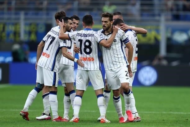 Rafael Toloi of Atalanta BC celebrates after scoring his team's second goal with team mates during the Serie A match between FC Internazionale and...