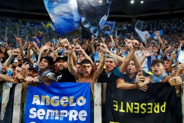 Lazio supporters celebrate after winning the Serie A match between SS Lazio and AS Roma at Stadio Olimpico on September 26, 2021 in Rome, Italy.