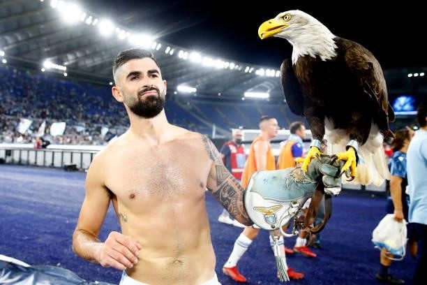 Elseid Hysaj of SS Lazio celebrates after winning the Serie A match between SS Lazio and AS Roma at Stadio Olimpico on September 26, 2021 in Rome,...