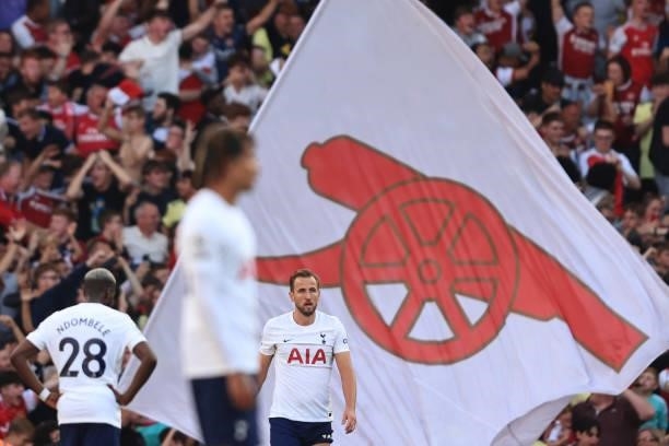 Dejected Harry Kane, Tanguy Ndombele and Dele Alli of Tottenham Hotspur during the Premier League match between Arsenal and Tottenham Hotspur at...