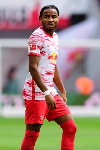 Christopher Nkunku of RB Leipzig looks on during the Bundesliga match between RB Leipzig and Hertha BSC at Red Bull Arena on September 25, 2021 in...