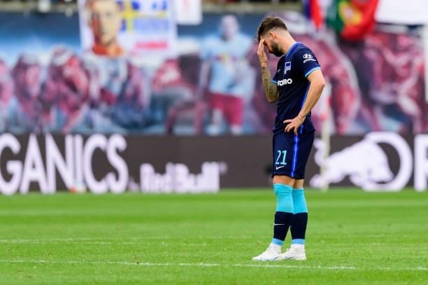 Marvin Plattenhardt of Hertha BSC looks dejected after the Bundesliga match between RB Leipzig and Hertha BSC at Red Bull Arena on September 25, 2021...