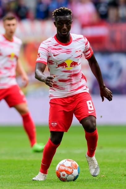 Amadou Haidara of RB Leipzig controls the ball during the Bundesliga match between RB Leipzig and Hertha BSC at Red Bull Arena on September 25, 2021...