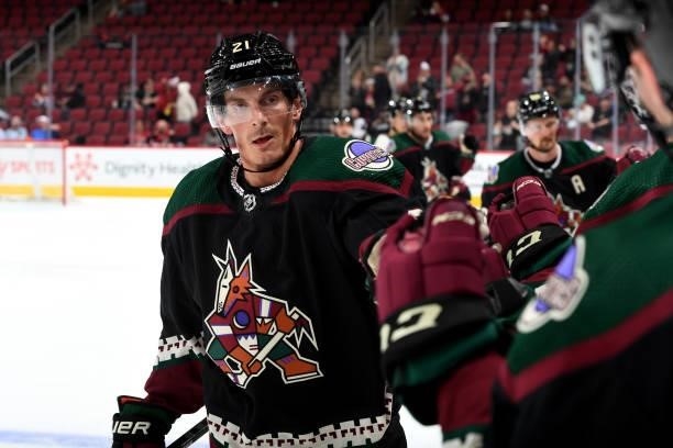 Loui Eriksson of the Arizona Coyotes celebrates with teammates on the bench after scoring a goal against the Los Angeles Kings at Gila River Arena on...
