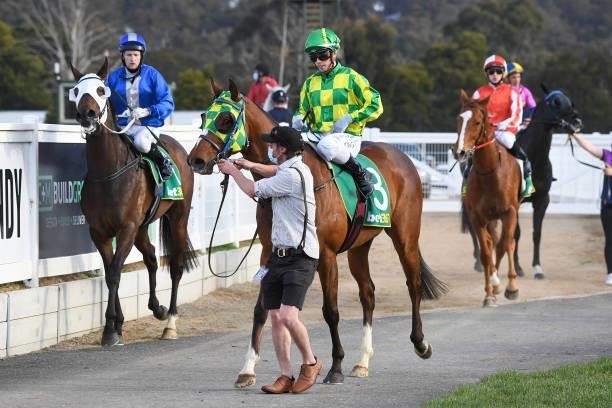 Marketing ridden by Lachlan King returns to the mounting yard after winning the MC Labour BM64 Handicap at Kilmore Racecourse on September 28, 2021...
