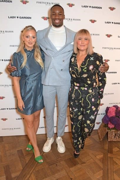 Georgia Hirst, Dr Emeka Okorocha and Mika Simmons attend the 7th annual Lady Garden Foundation lunch at Fortnum & Mason on September 28, 2021 in...