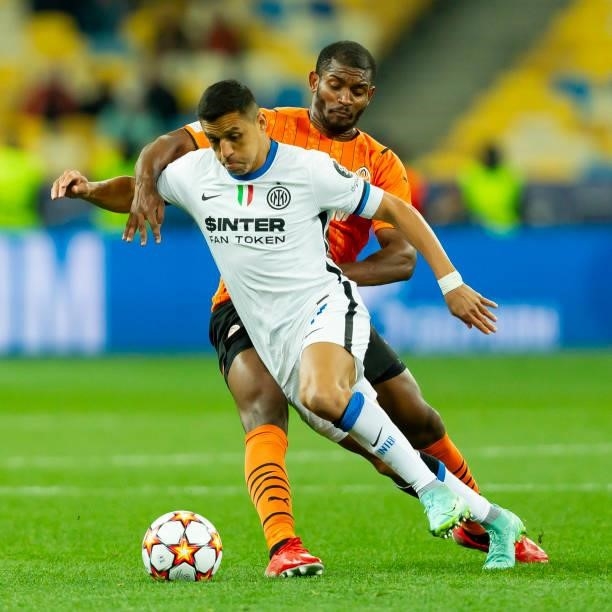 Alexis Sanchez of FC Internazionale and Marlon of FC Shakhtar Donetsk battle for the ball during the UEFA Champions League group D match between...