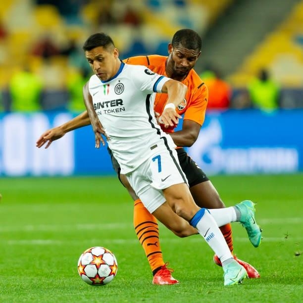 Alexis Sanchez of FC Internazionale and Marlon of FC Shakhtar Donetsk battle for the ball during the UEFA Champions League group D match between...