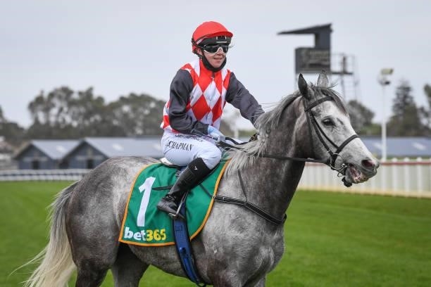 Tianni Chapman returns to the mounting yard on Grey Khan after winning the APCO Service Stations BM64 Handicap, at Geelong Racecourse on September...