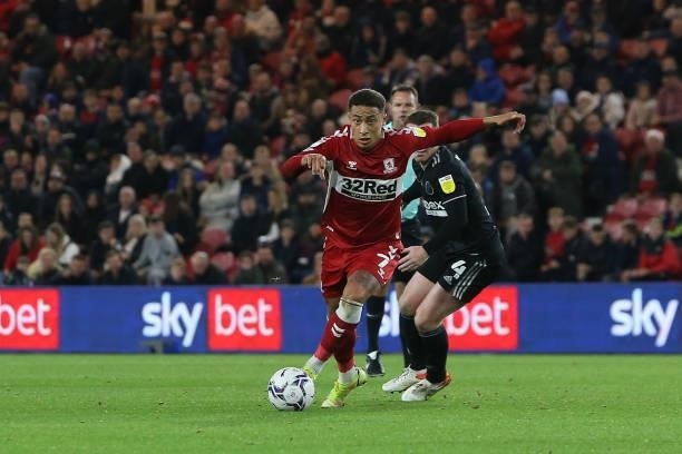 Middlesbrough's Marcus Tavernier in action with Sheffield United's John Fleck during the Sky Bet Championship match between Middlesbrough and...
