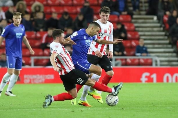 Liam Sercombe of Cheltenham Town is challenged during the Sky Bet League 1 match between Sunderland and Cheltenham Town at the Stadium Of Light,...