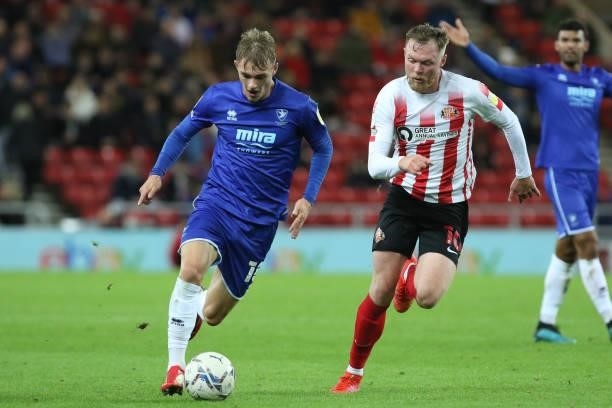 Taylor Perry of Cheltenham Town and Aiden O'Brien of Sunderland in action during the Sky Bet League 1 match between Sunderland and Cheltenham Town at...