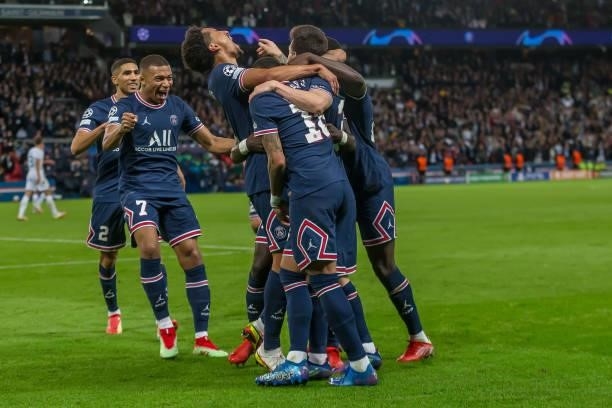 Lionel Messi of Paris Saint-Germain celebrates after scoring his team's second goal with teammates during the UEFA Champions League match between...