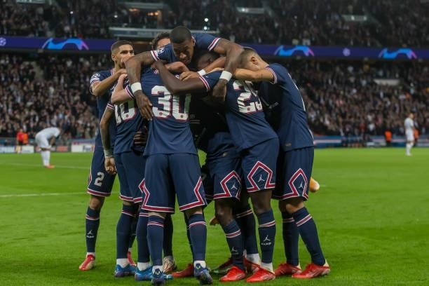 Lionel Messi of Paris Saint-Germain celebrates after scoring his team's second goal with teammates during the UEFA Champions League match between...