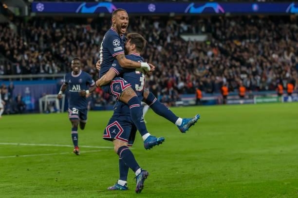 Neymar of Paris Saint-Germain and Lionel Messi of Paris Saint-Germain celebrates after scoring his team's second goal with teammates during the UEFA...